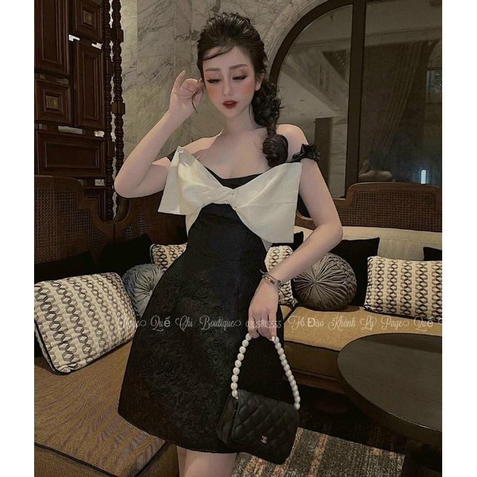 Đầm xòe gấm trễ vai nơ xoắn