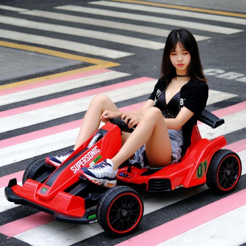 HOTNet nổi tiếng kart ô tô điện trẻ em bốn bánh xe drift có điều khiển từ xa xe đẩy trẻ em nam và nữ ô tô đồ chơi có thể