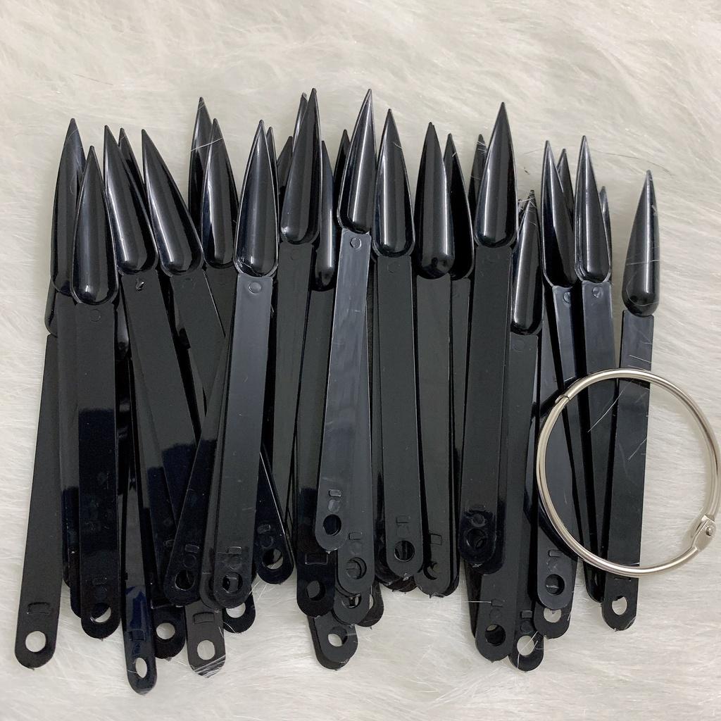 Móng que nhọn đen