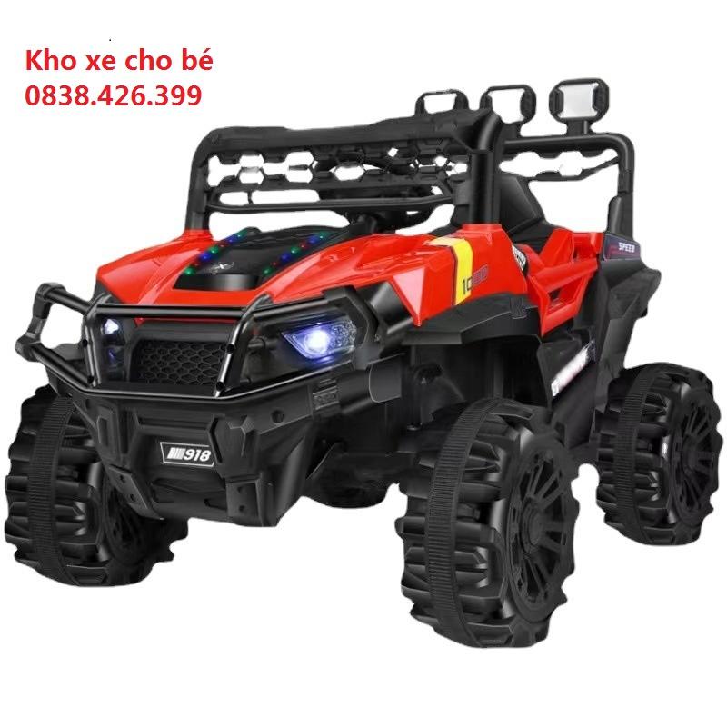 (Loại đẹp)Xe oto điện địa hình gầm cao 2 động cơ bánh chống sóc có nhạc đèn điều khiển từ xa cho bé