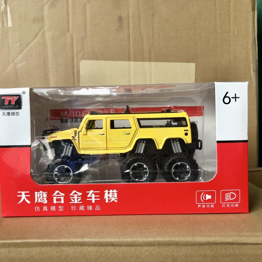 Xe mô hình FORD HUMMER tỷ lệ 1:32 bằng hợp kim nguyên khối có nhạc và đèn mở được 6 cửa, 6 bánh xe