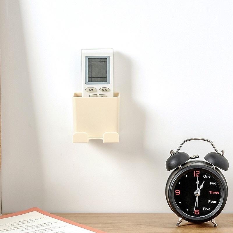 Giá để điều khiển remote treo tường mẫu mới có khay để điện thoại - Kệ dán tường đựng remote kèm giá đỡ sạc điện thoại