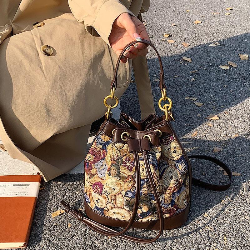 Wholesale fashion new bucket bag canvas bear pattern women's bag drawstring exquisite handbag women's bag shoulder cross-body bag