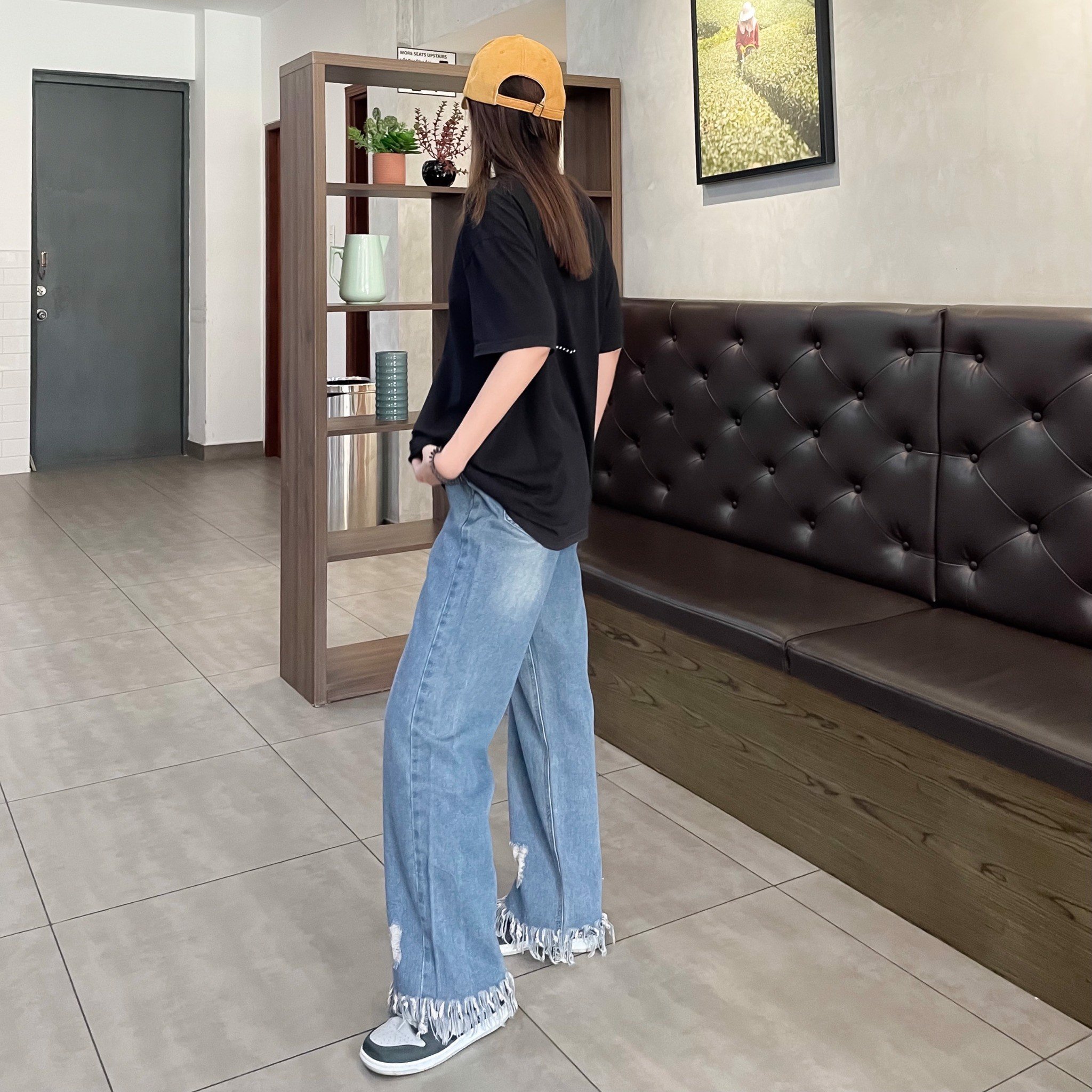 Quần jeans nữ ống rộng gấu tua rua