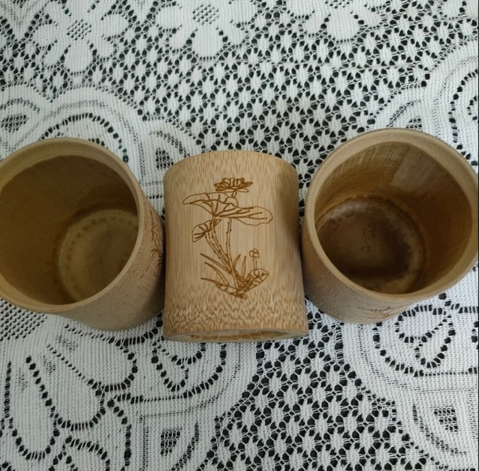 Cốc tre đựng gạo trong mâm cúng thôi nôi đầy tháng