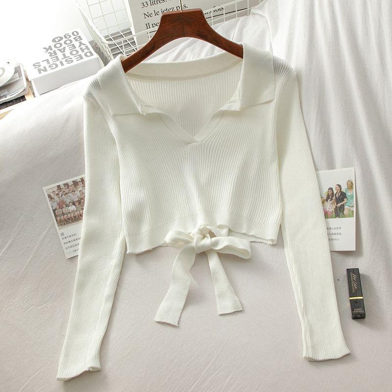 Áo croptop tay dài hở lưng buộc nơ trắng đen
