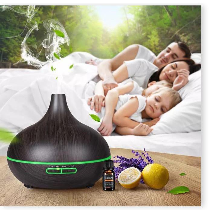 Máy khuếch tán tinh dầu vân gỗ nâu có remote Home&amp;Spa + tặng 1 lọ tinh dầu xả