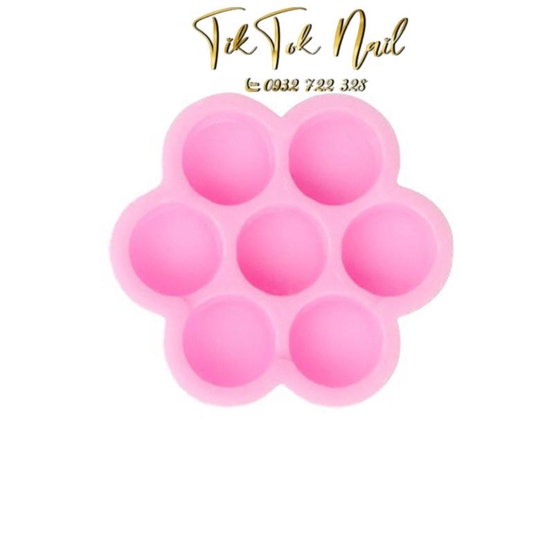 Nút hoa mai chấm keo mi