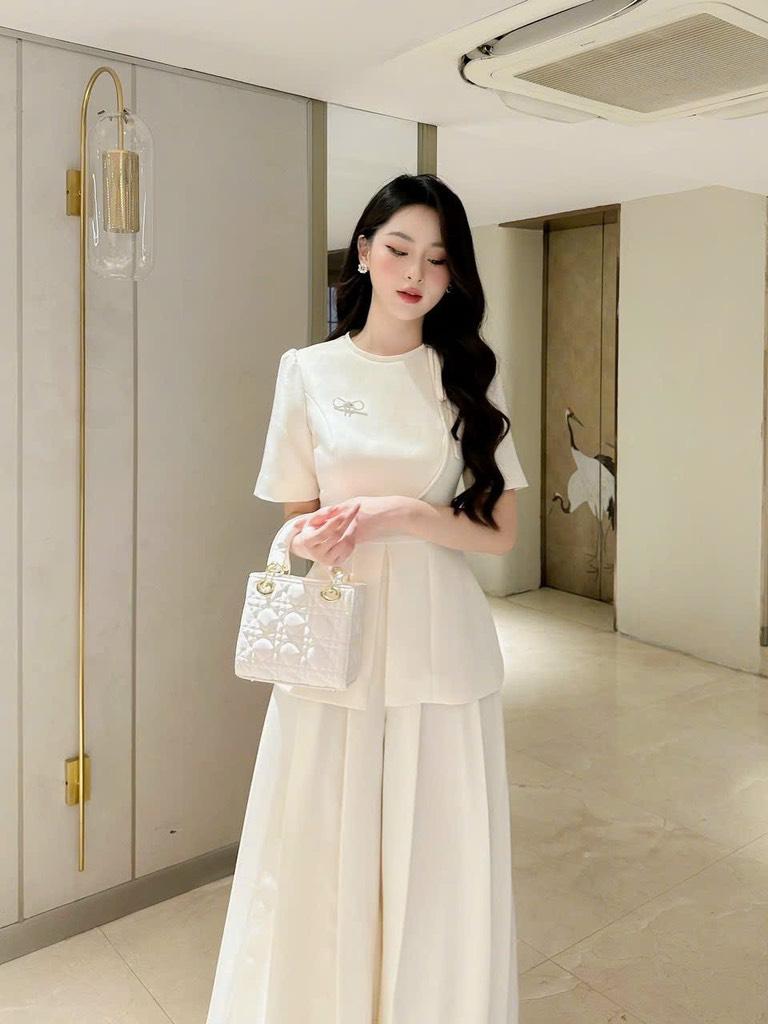 Áo tay phồng cổ nơ