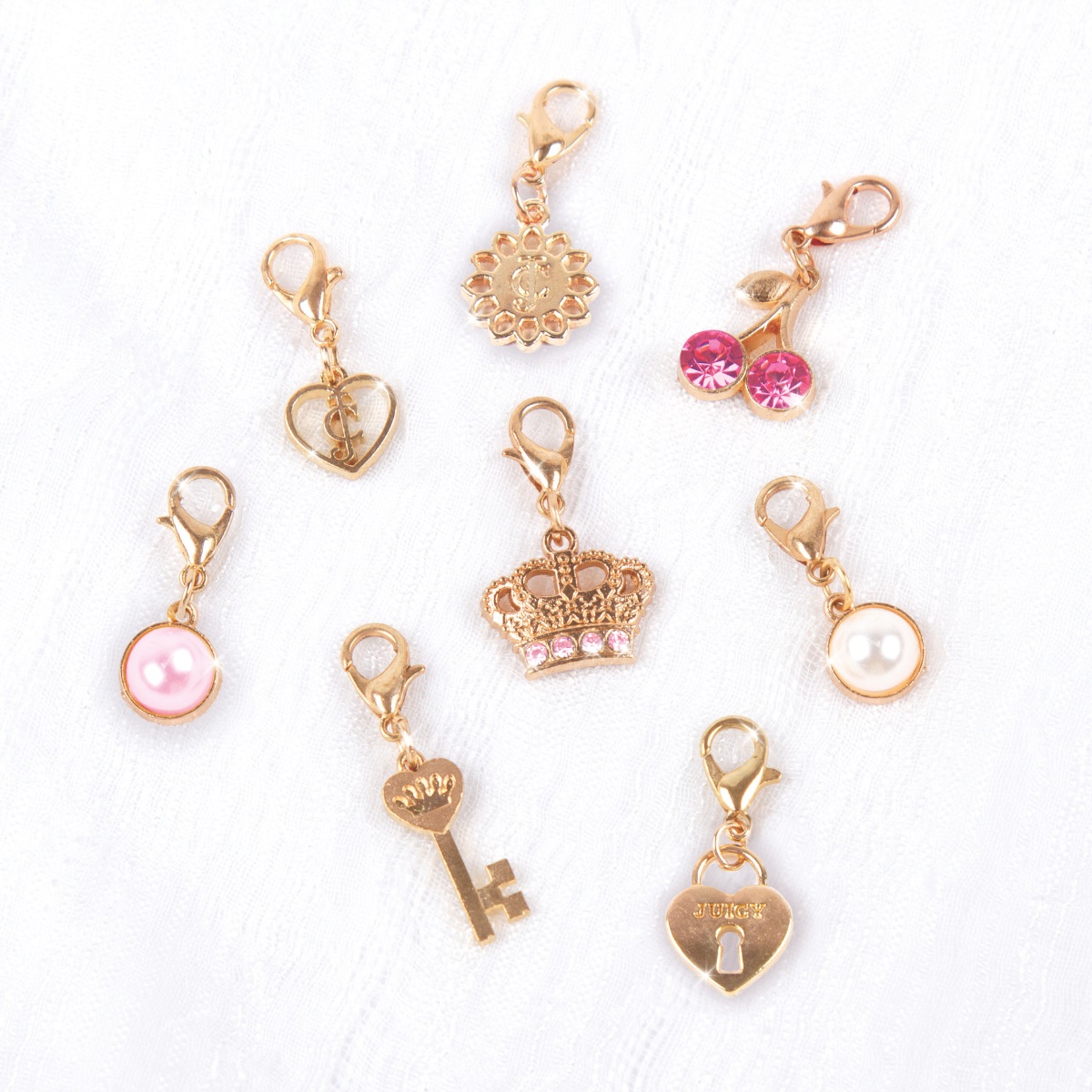 Đồ Chơi Bộ Làm Vòng Tay Juicy Couture Hồng Điệu Đà MAKE IT REAL 4413MIR