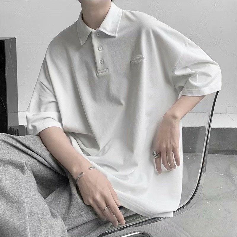 Áo polo unisex có phối logo trước ngực, chất cotton mền và mát A3