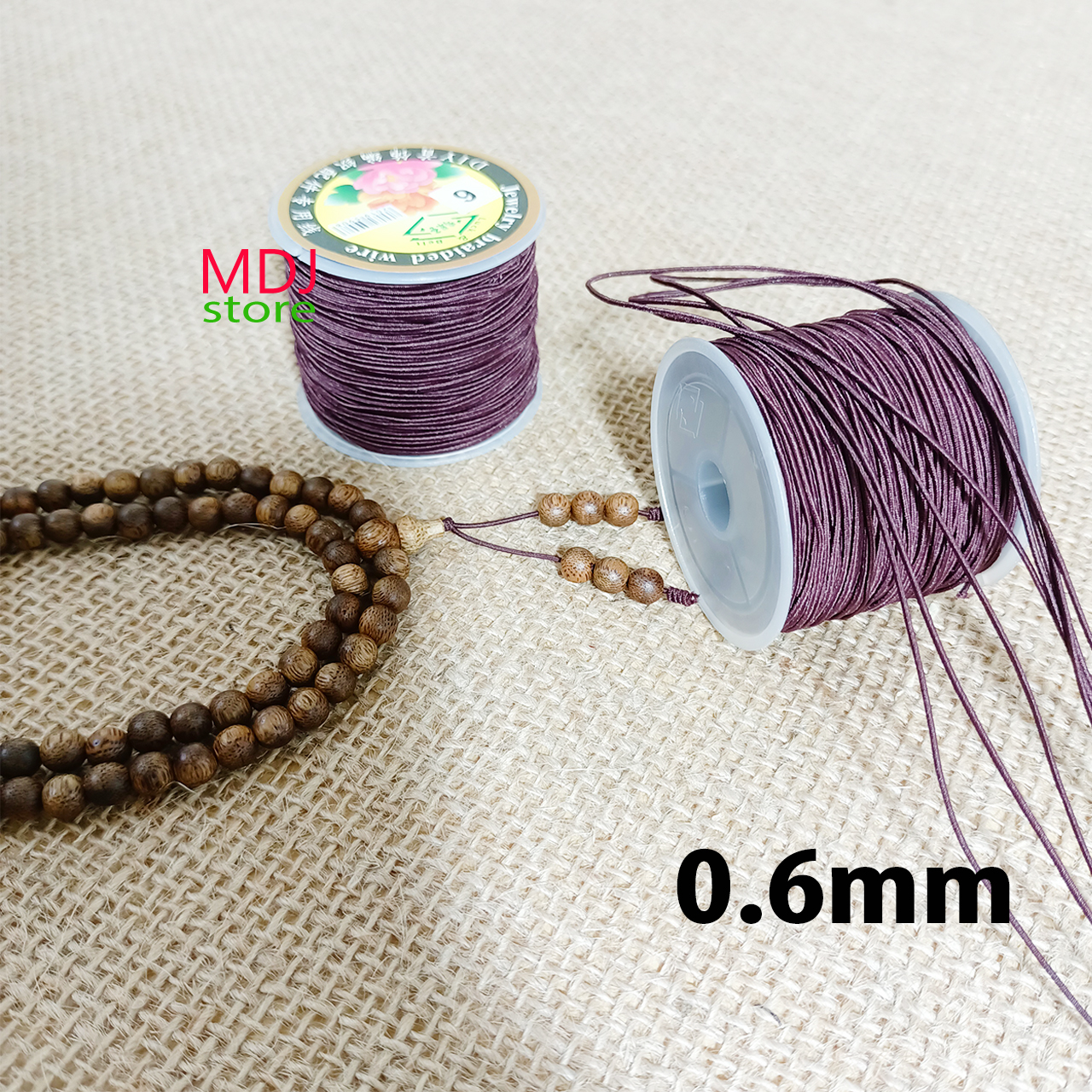 Dây thun co giãn MDJ xâu vòng gỗ chuỗi 108 hạt cuộn 25 m cỡ dây 0,6mm