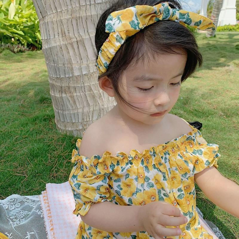 Váy Hoa Đi Biển Cho Bé Gái Kèm Nơ Xinh Xắn