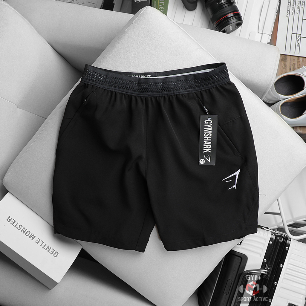 Quần short nam thể thao quần đùi chạy bộ tập gym nam short GymShark chất xi ( dù ) vát gấu phom ngắn trên gối