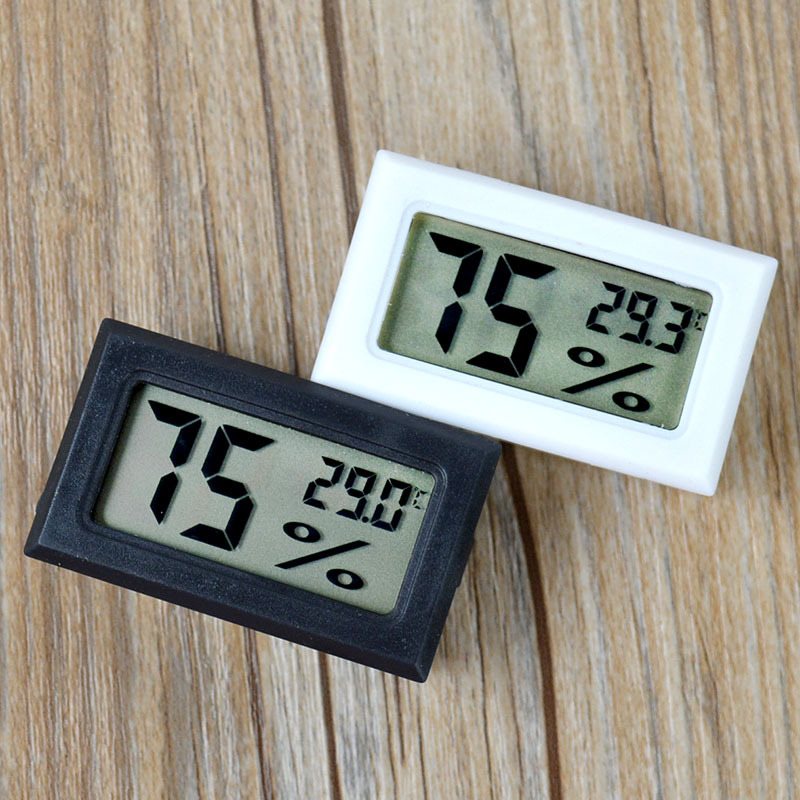 Nhiệt ẩm kế mini đo nhiệt độ độ ẩm trong nhà, xe hơi, văn phòng nhỏ gọn tiện ích, chính xác cao- kèm pin (Màu đen- trắng giao màu ngẫu nhiên)