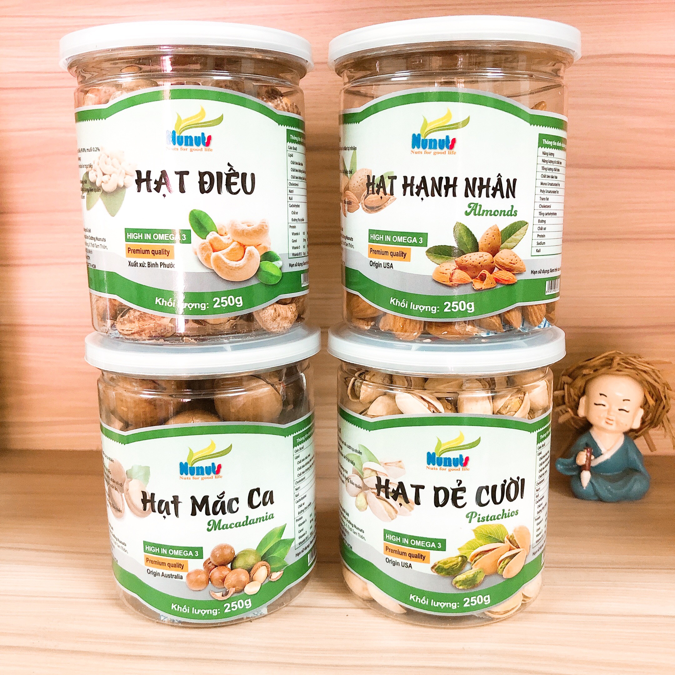 COMBO 4 HŨ HẠNH NHÂN TỰ NHIÊN, MACCA CÒN VỎ, HẠT ĐIỀU CÒN VỎ LỤA, HẠT DẺ CƯỜI NUNUTS (LOAI 250G)