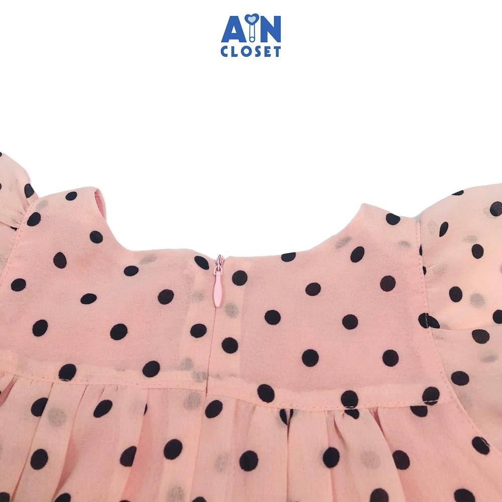 Đầm bé gái họa tiết Bi nơ đen nền hồng lụa cát - AICDBG9WLJME - AIN Closet