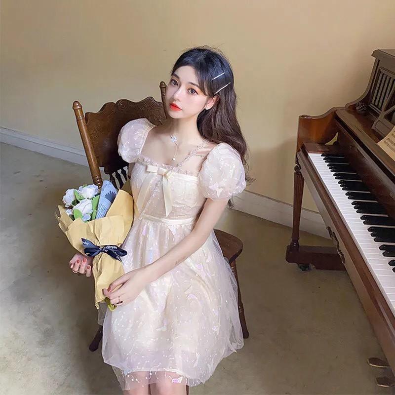 Váy trắng tay bồng lấp lánh