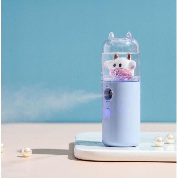 MÁY PHUN SƯƠNG , TẠO ĐỘ ẨM XÔNG HƠI MẶT NANO MINI CẦM TAY HÌNH CHÚ BÒ SỮA ĐÁNG YÊU