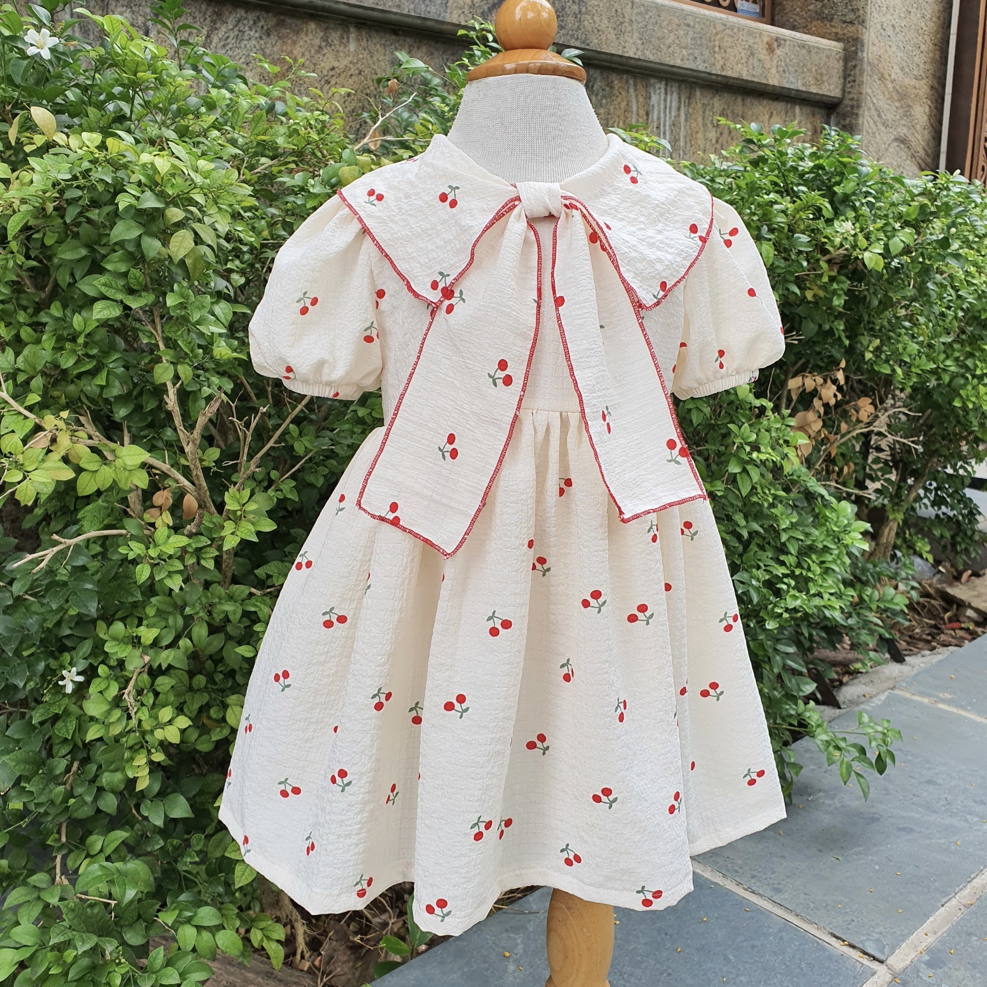 Váy Nơ Cổ Hoạ Tiết Cherry Nhí Bé Gái 4 Đến 28kg, Đầm Bé Gái Chất Đũi Xốp