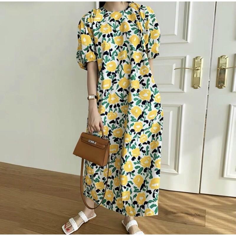 Váy maxi hoa cúc vàng nổi bật
