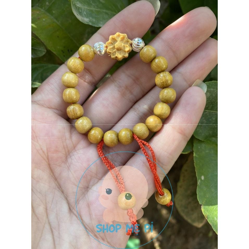 Vòng dâu tằm mix hoa sen và 2 bi bạc cho bé yêu