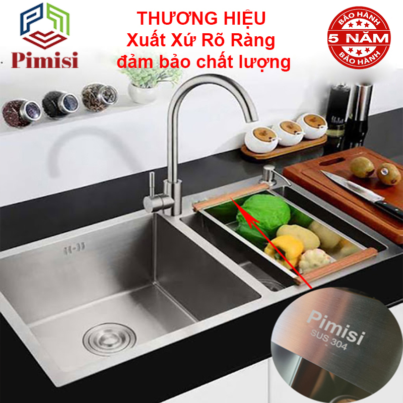 Chậu rửa chén bát inox 304 Pimisi đúc 2 hốc lệch, kích thước bồn rửa bát 78 x 43 - 82 x 45 cm làm từ thép không gỉ sus 304 đầy đủ xi phông loại to và kèm rổ đựng đồ dùng để rửa chén bát gắn được cả âm - dương bàn đá bếp | Hàng chính hãng