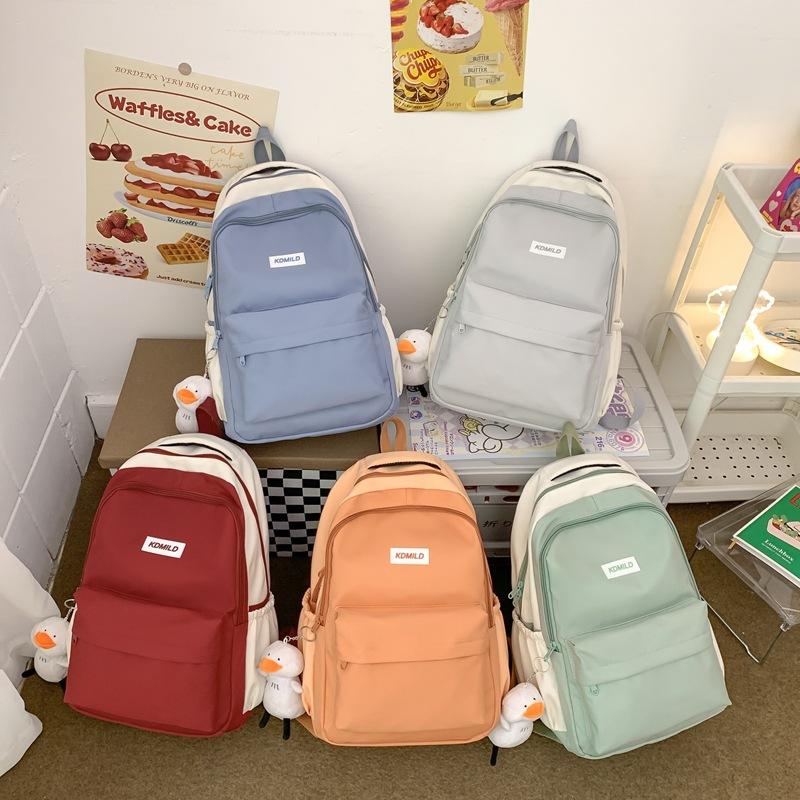 Phong cách mới nhất của ba lô nữ phong cách Harajuku sức chứa lớn phiên bản mới của cặp học sinh cấp hai dành cho học sinh trung học nổi bật ba lô nam màu sắc