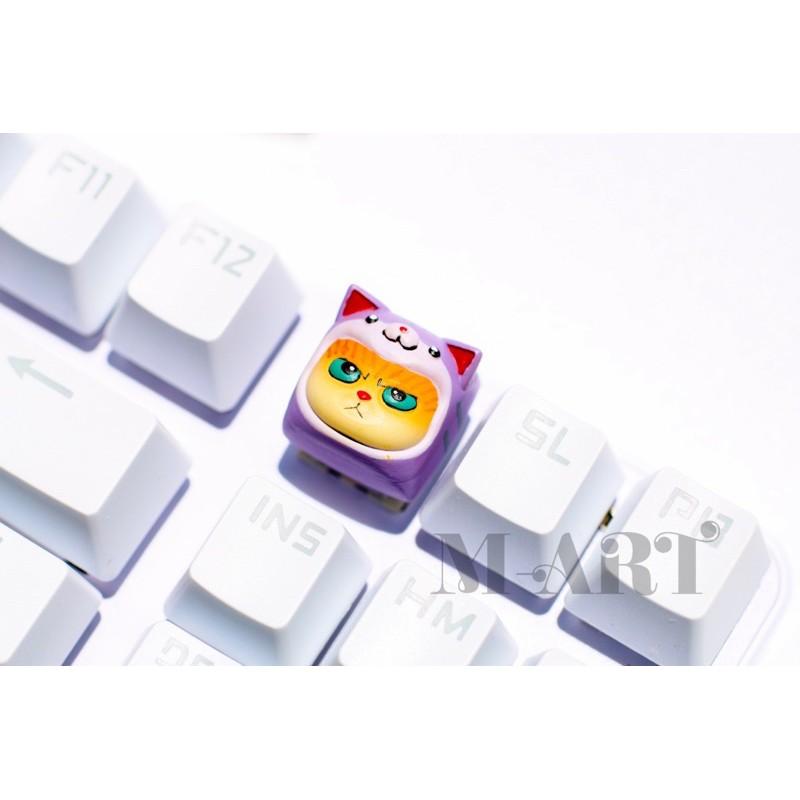 Keycaps mèo dễ thương và chiếc mũ màu tím