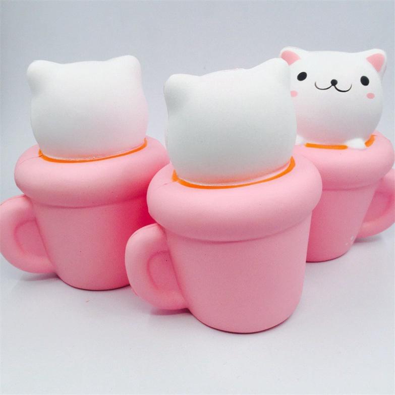 Squishy MÈO HỒNG nằm trong cốc squishy cốc thỏ hồng dễ thương ngộ nghĩnh