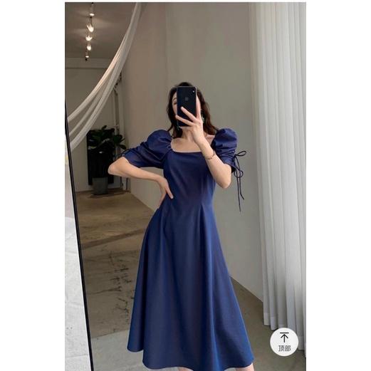 Đầm midi xanh navy tay rút phồng