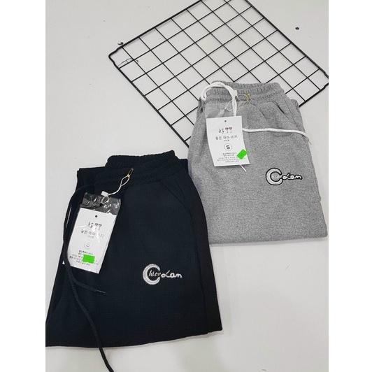 Quần thể thao xẻ gấu chất len tổ ong