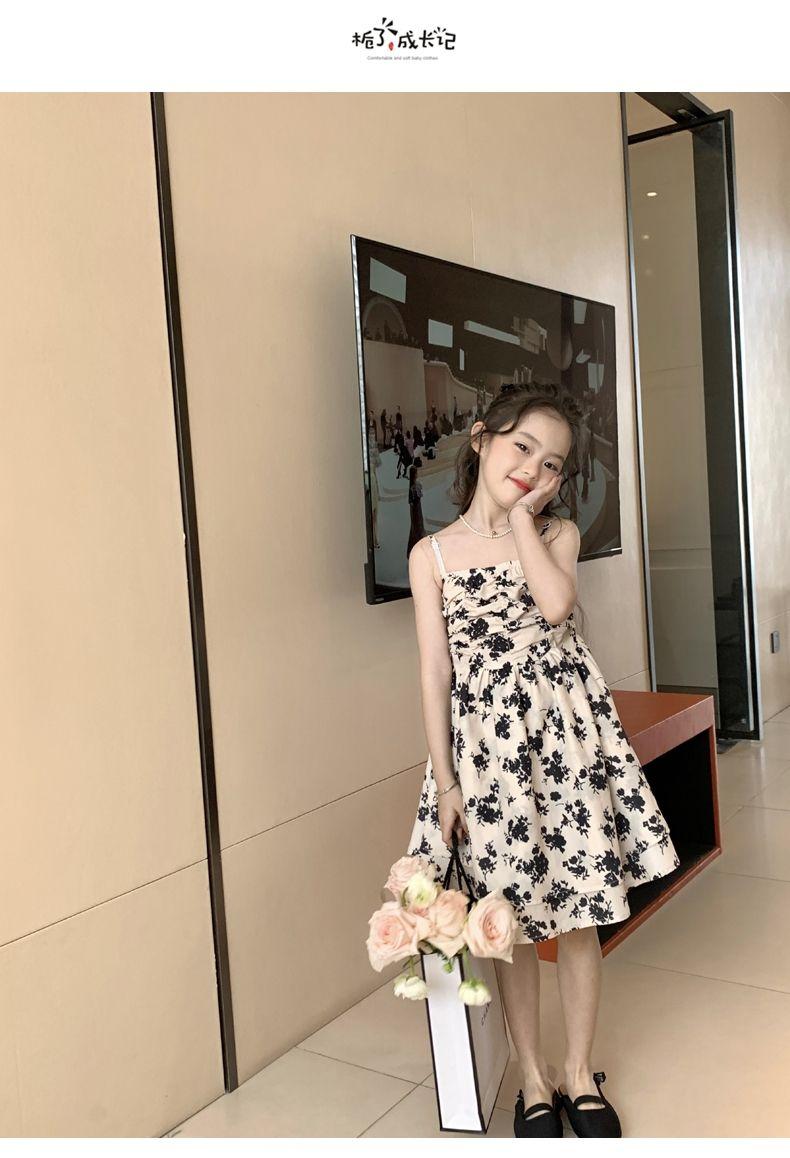SHUANGYAN Yuanbaoth trẻ em ăn mặc thời trang phù hợp với phong cách phương Tây mùa xuân ăn mặc trẻ em gái mảnh hoa sling váy dệt kim áo choàng