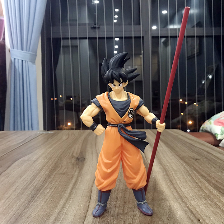 Mô Hình Songuku Cầm Gậy. Mô Hình Dragon Ball. Sản phẩm làm từ nhựa PVC đặc siêu xịn và đầm tay. Bày Taplo ô tô, tủ sách, decor trang trí phòng khách, bàn làm việc. Đồ chơi làm quà tặng cho trẻ em cực kỳ thú vị