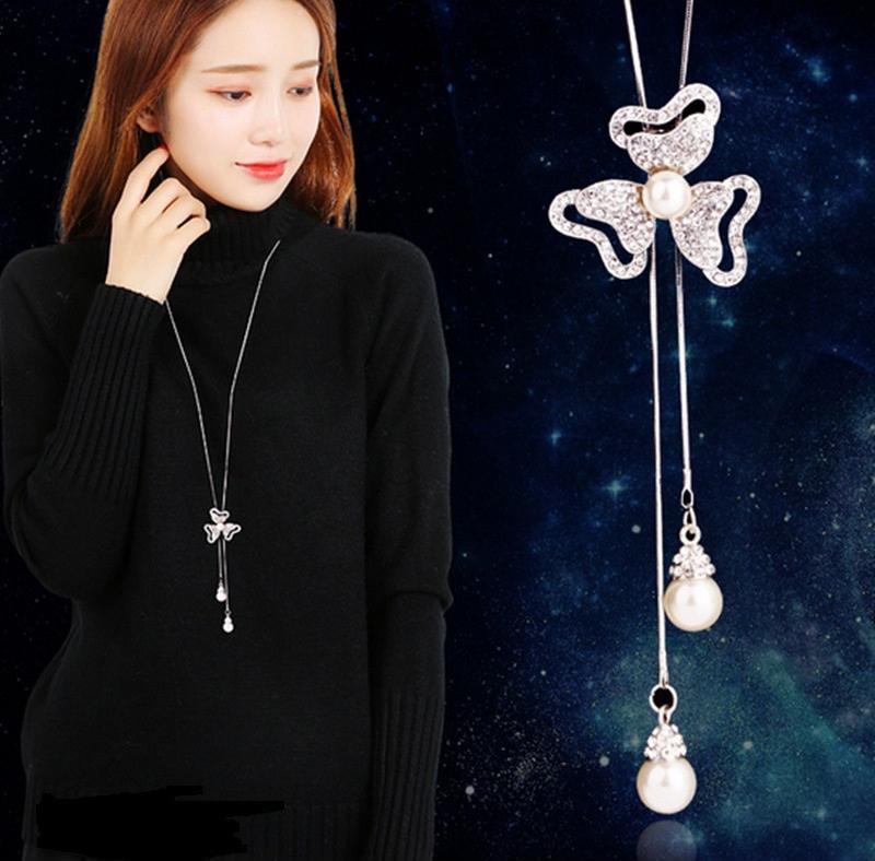 Dây chuyền dáng nơ 3 cánh ngọc trai