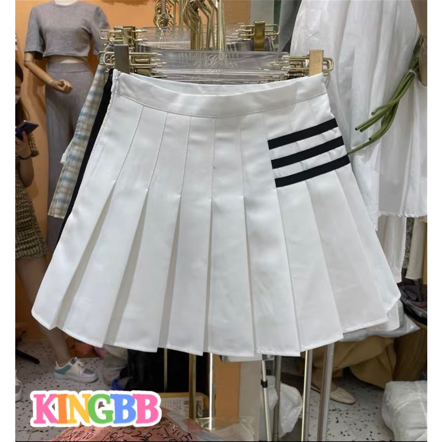Chân váy xếp ly cho bé gái màu trắng phối đồ phong cách Hàn Quốc size 12-55kg