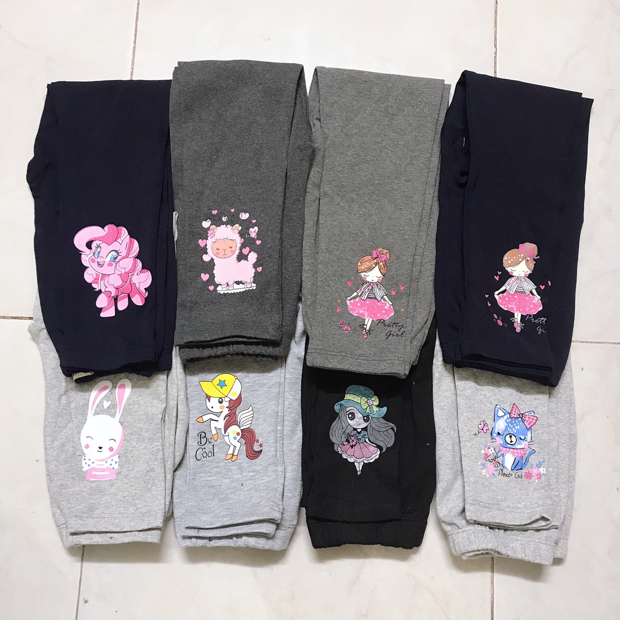 Quần legging cho bé gái chất cotton len co giãn thoải mái hình in sắc nét ngộ nghĩnh cho bé từ 20 kg đến 25 kg dài quần 64 cm