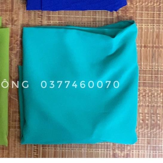 Áo dài họa tiết hoa sen phối tay xanh