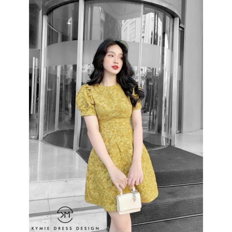 Đầm xòe gấm tay phồng nơ sau lưng