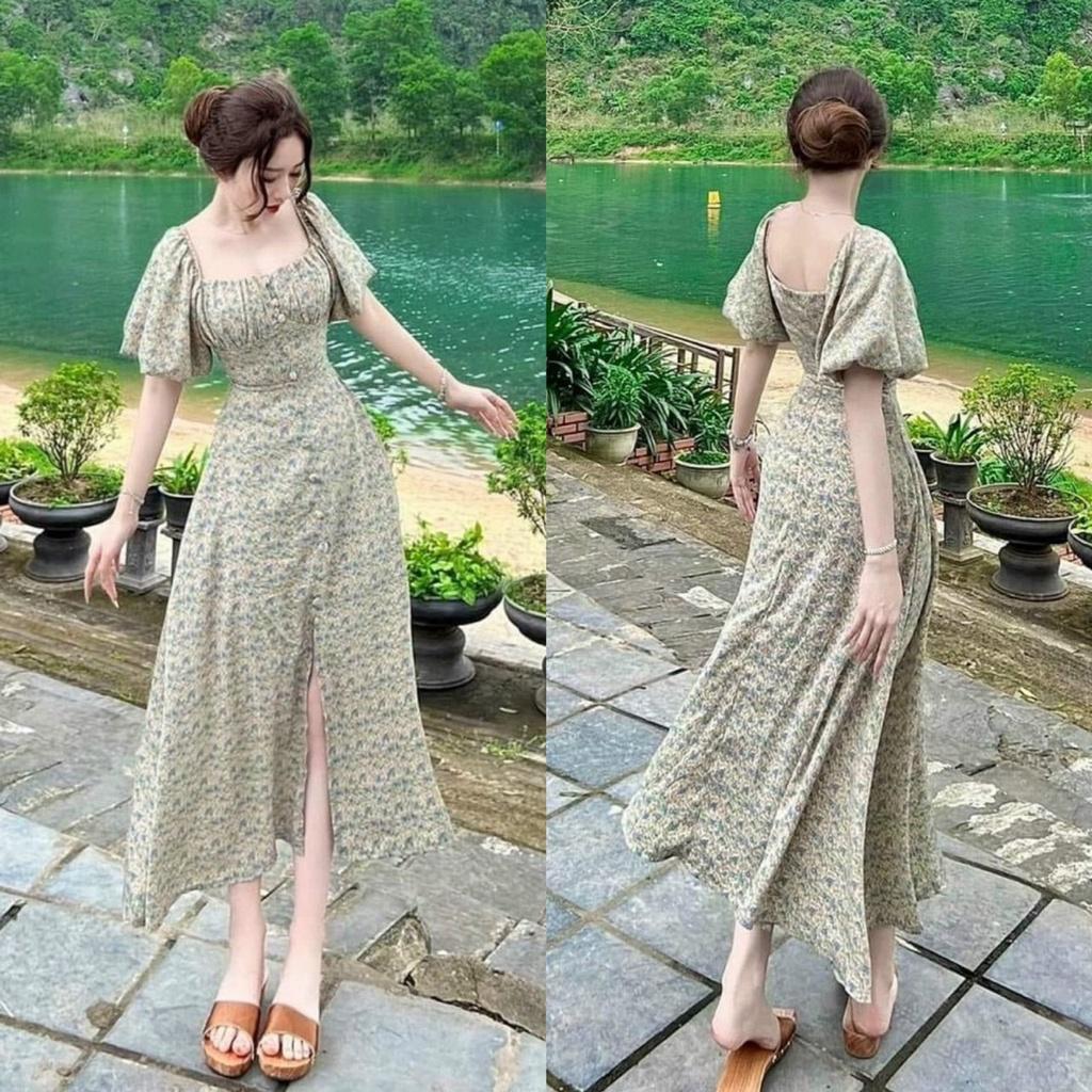 Đầm maxi, hoa tay phồng cổ vuông nút bọc xẻ tà có xinh xắn màu xanh giúp nàng nổi bật