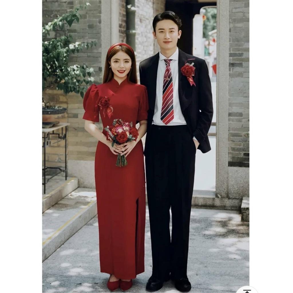 Đầm đỏ cổ tàu tay bồng xẻ tà áo dài cưới cô dâu đi chùa chúc tết