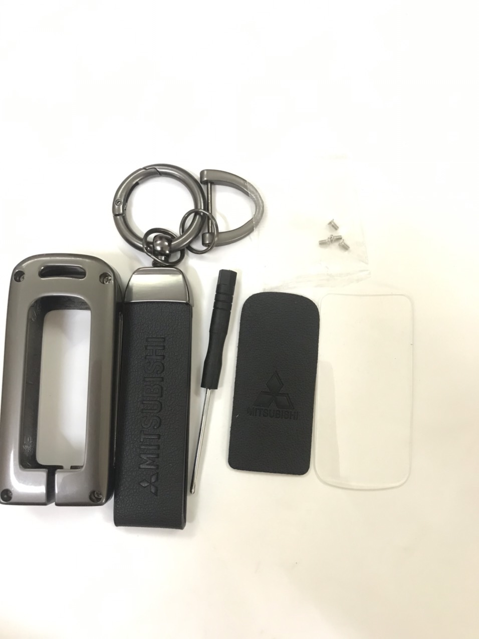 Ốp chìa khóa inox Mitsubishi Xpander , Attrage, Mirrage. Outlander - tặng kèm dây móc khóa  chữ mitsubishi