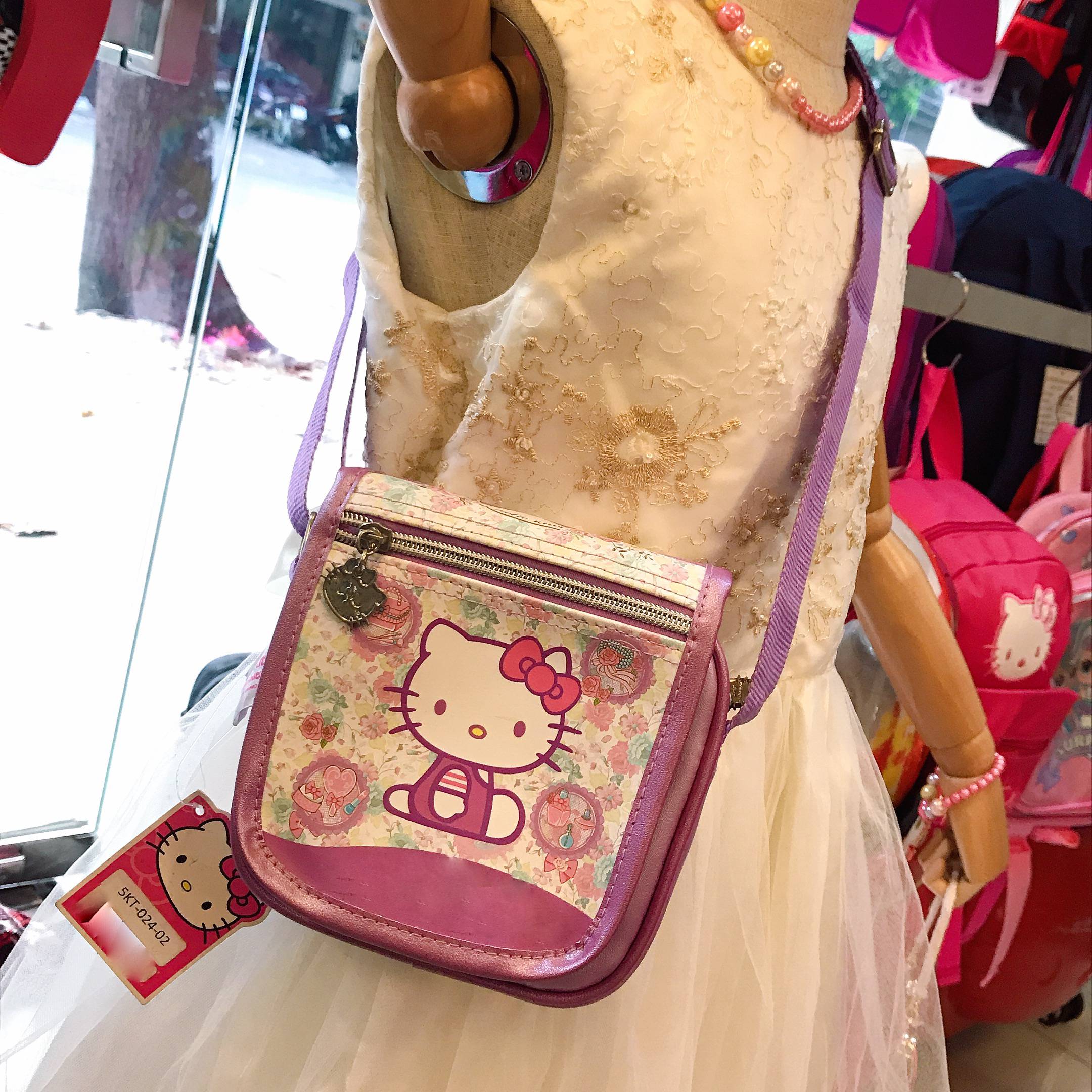 Túi đeo chéo hình mèo Kitty hoa hồng màu tím trắng cho bé gái (Thái Lan) - 2905KT02402 - (15x5x15cm)
