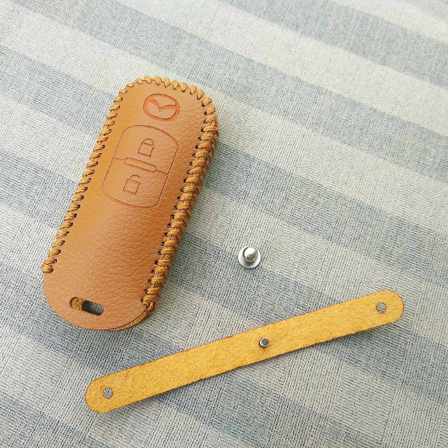 Bao da 2 nút chìa khóa smartkey xe hơi Mazda
