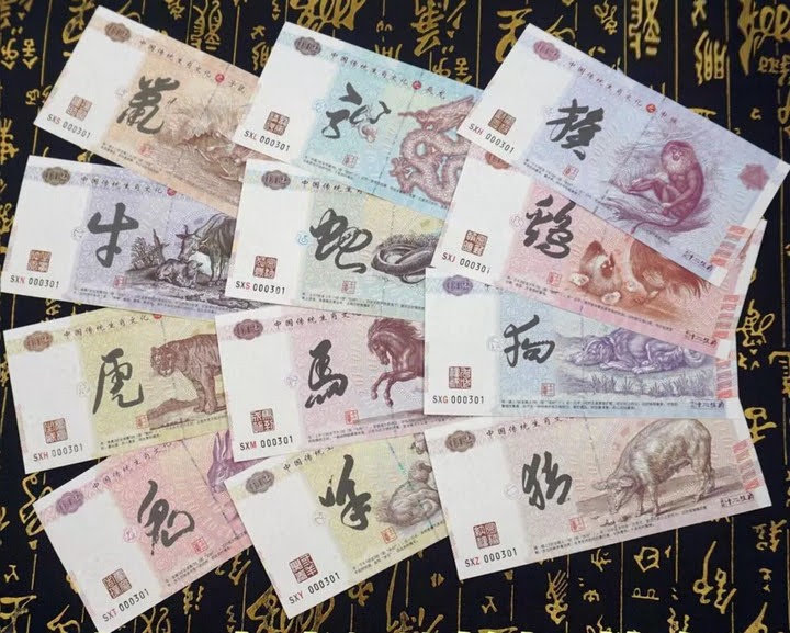 Bộ 12 con giáp kỷ niệm của Trung Quốc, Quà tặng tiền lì xì độc lạ cho bạn bè và người thân nhân dịp năm mới, Lễ Tết, kích thước 155 x 75mm, màu vàng chủ đạo, trắng, tím - TMT Collection - TLX033