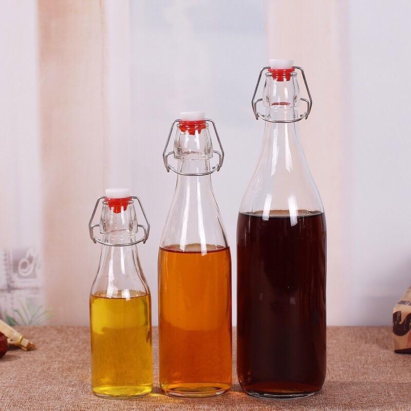 Chai thuỷ tinh nắp cài đựng nước ép, mật ong