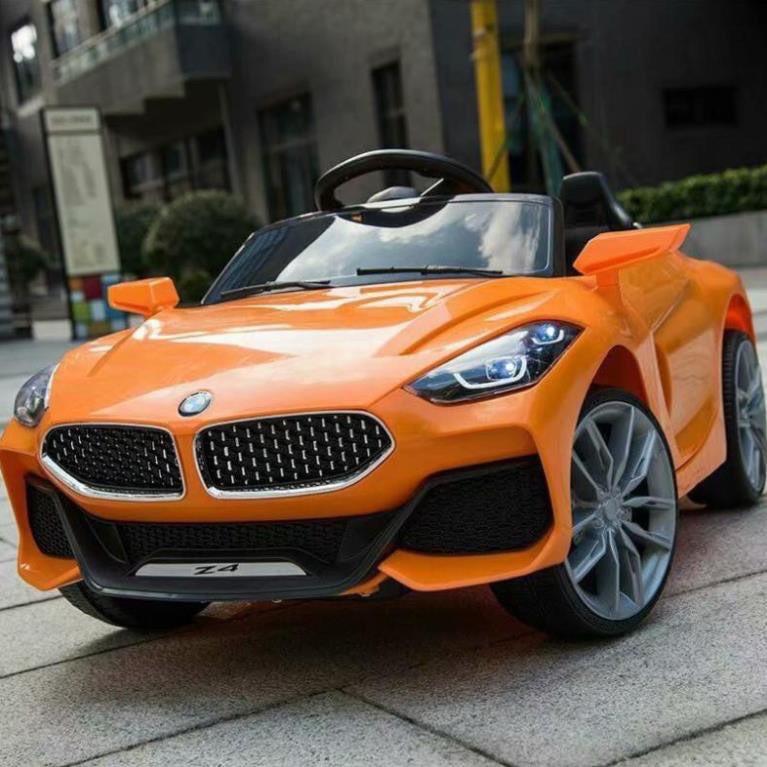 Ô TÔ ĐIỆN TRẺ EM BMW Z4 có điều khiển từ xa và tự lái , có nhạc usb