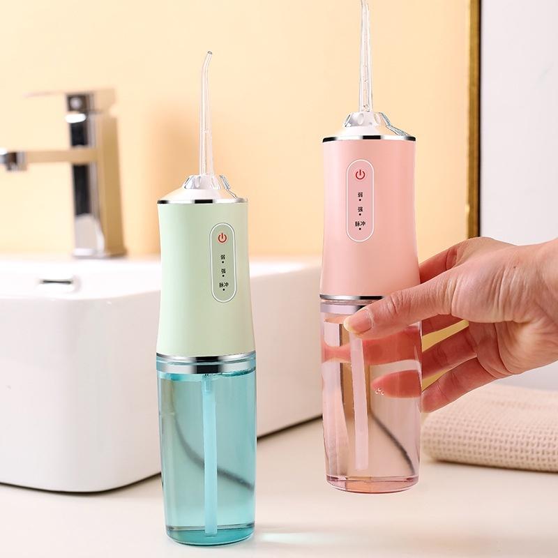 Tăm nước Oral Irrigator làm sạch răng miệng, tiêu chuẩn châu Âu kèm 3 đầu phun, bảo hành 12 tháng