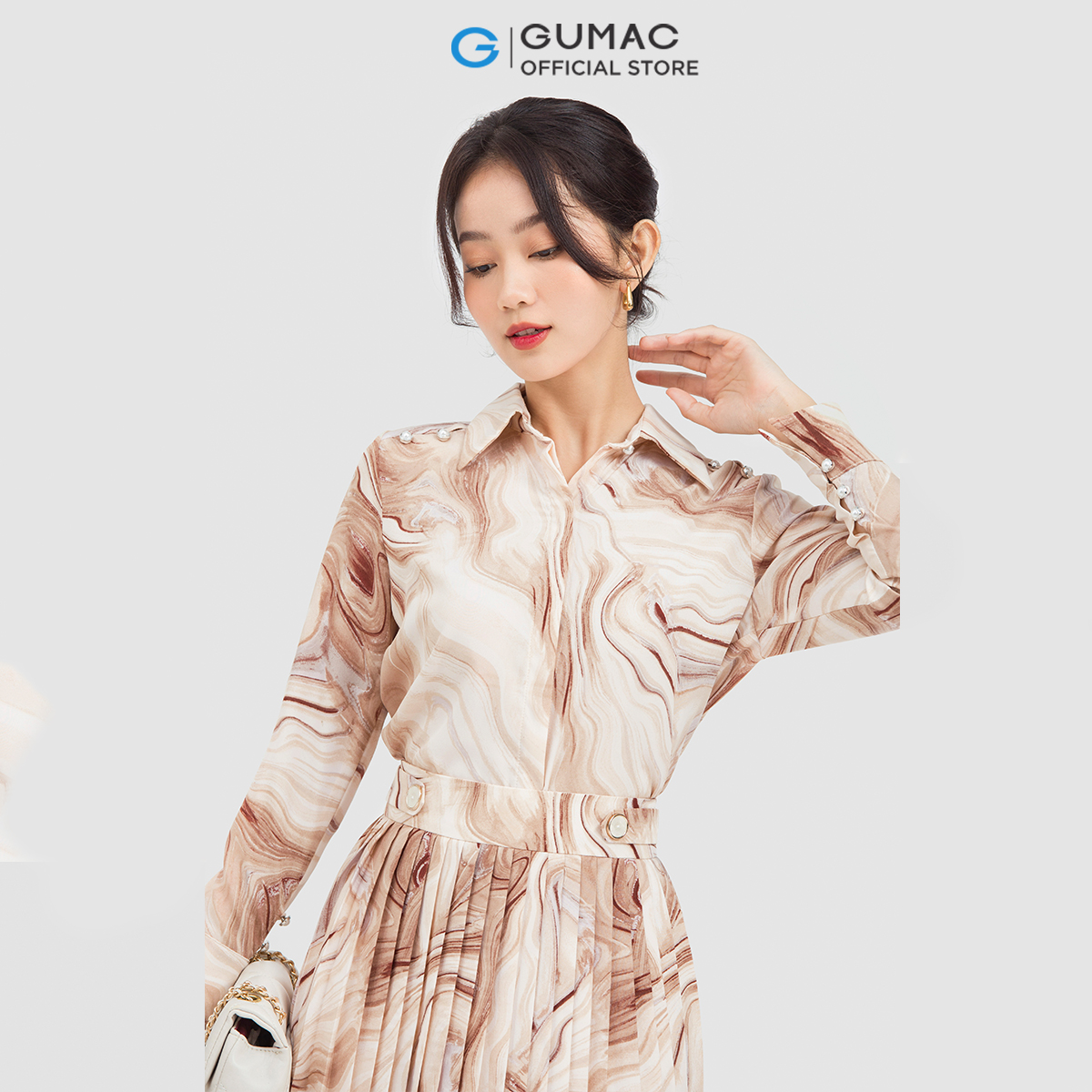 Chân váy dáng xòe GUMAC VC06031 dập ly