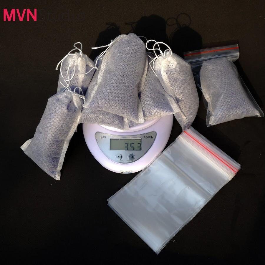 Gói 100g và 200g hạt chống ẩm, hạt hút ẩm màu xanh cho máy ảnh